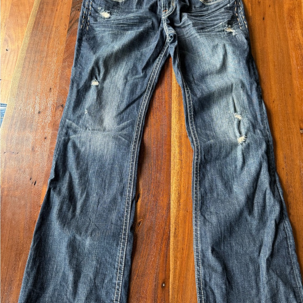 MEK Blue Flare & Wide Leg Jeans with Distressed Details